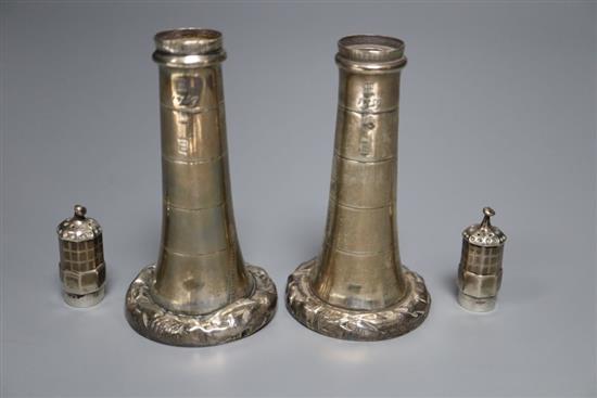 A pair of Victorian novelty silver pepperettes modelled as lighthouses, inscribed on each base Smeatons Edystone Lighthouse